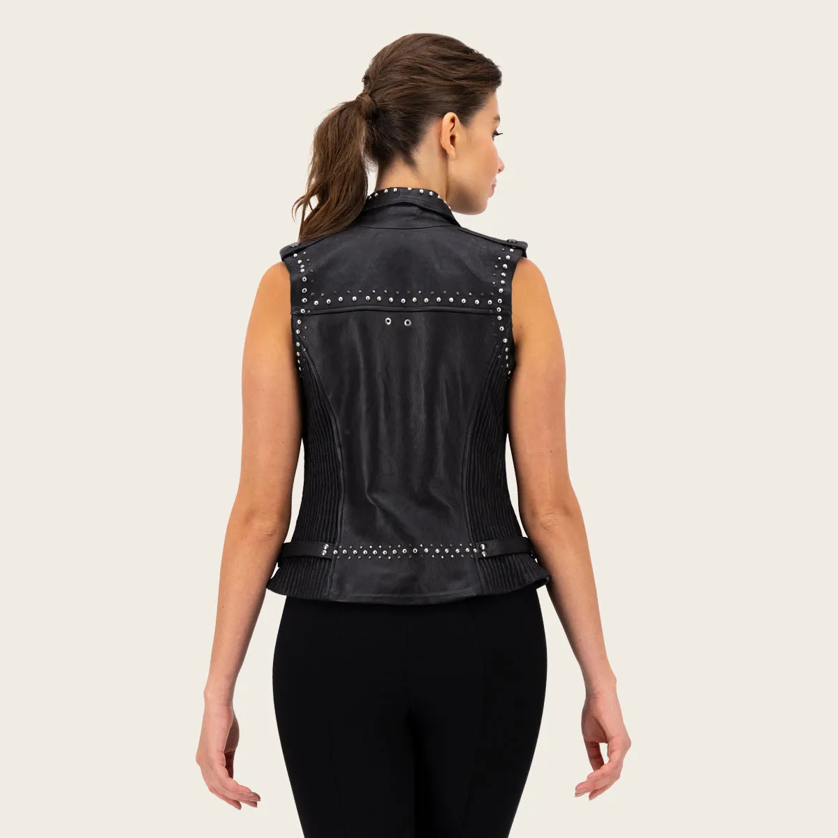 Black biker vest full of studs