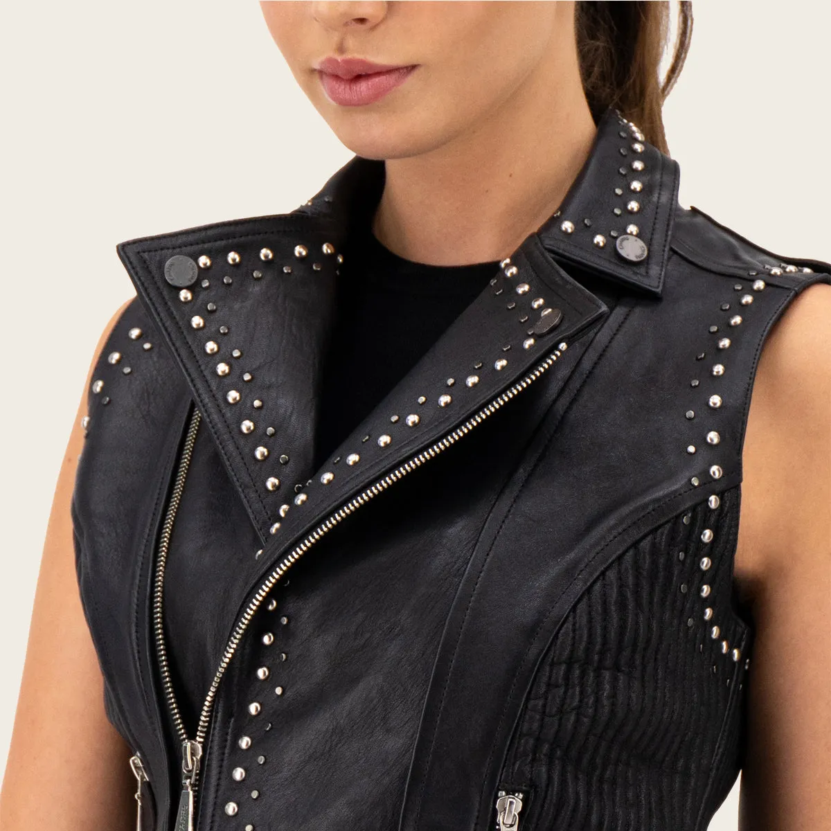 Black biker vest full of studs